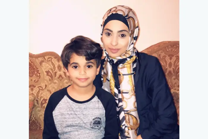Zaman Mashrah with her 9-year-old son